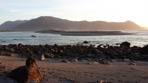 Martins Bay sand spit at sunset